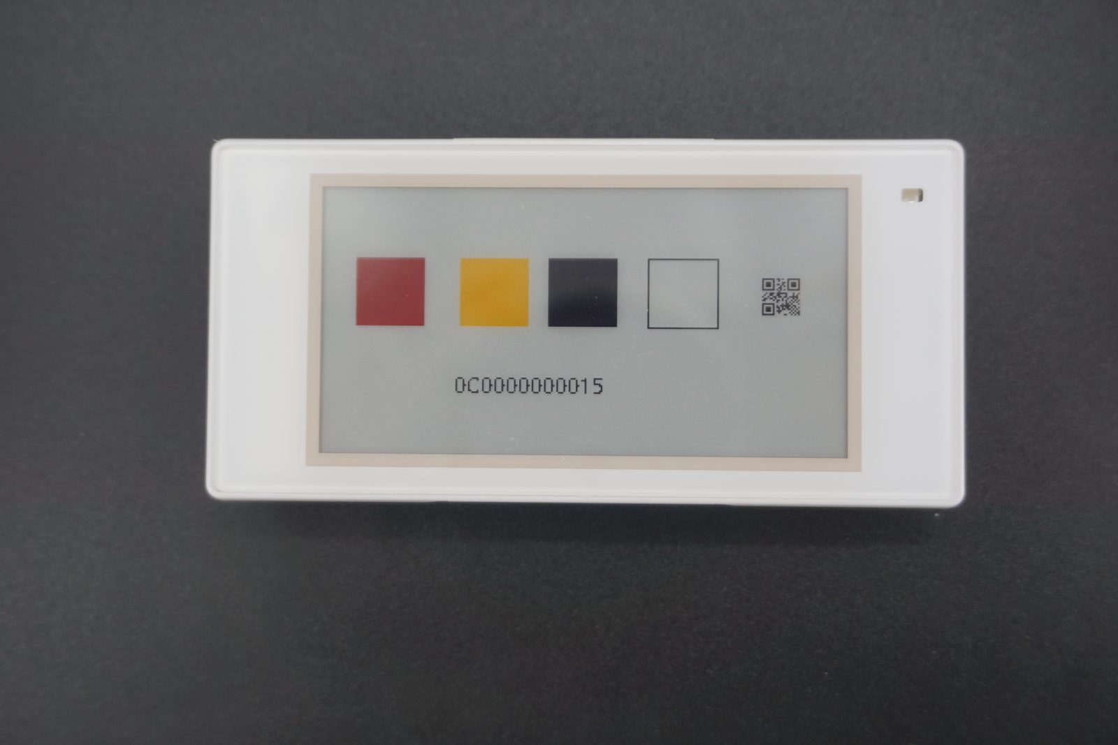 Four-colour electronic shelf label showing red, yellow, black and white