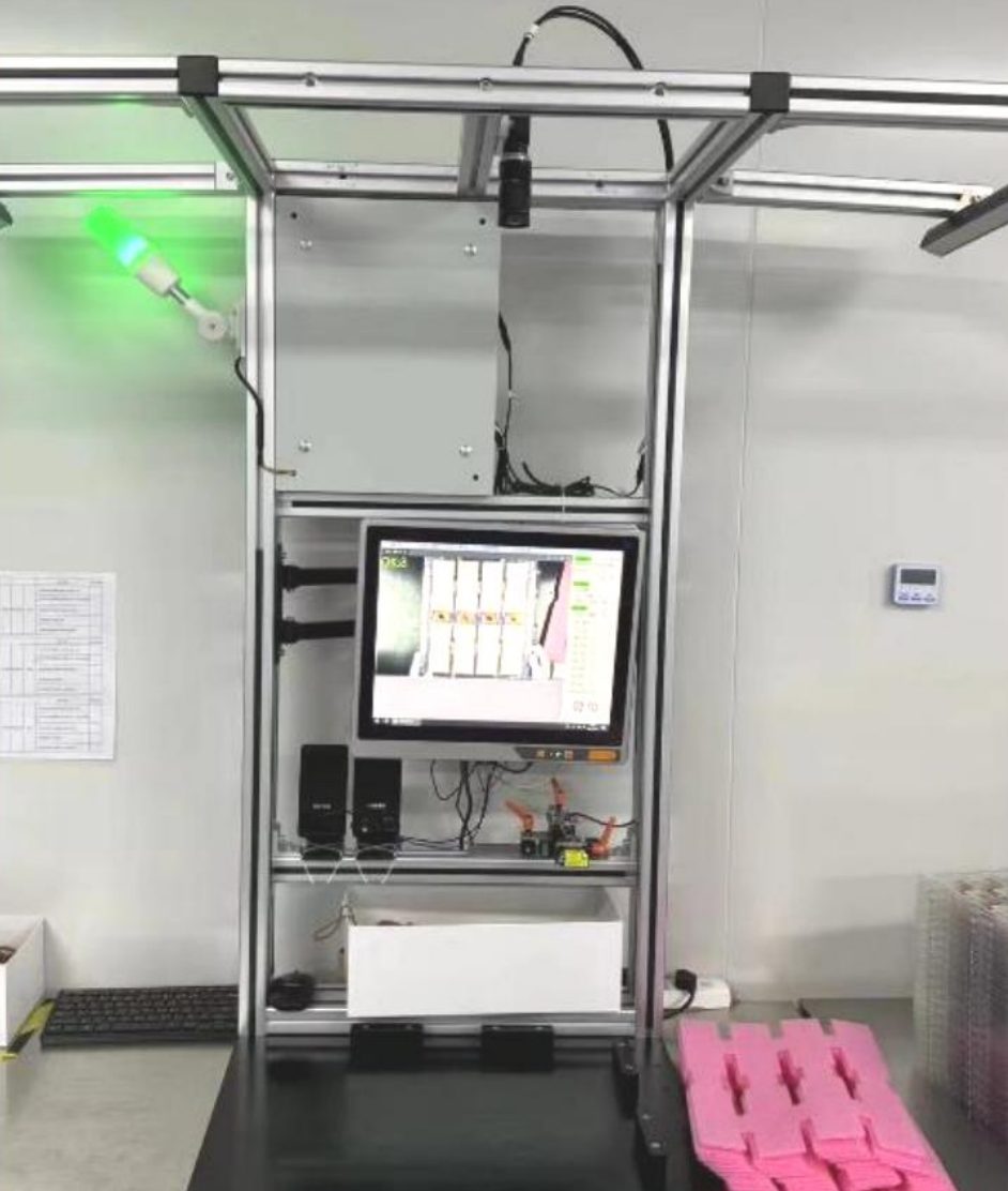 Camera check of display modules during packing